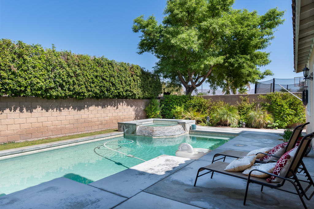 83460 Lone Star Road Indio, CA 92203 - Photo 31 of 40 a view of a lake with outdoor seating