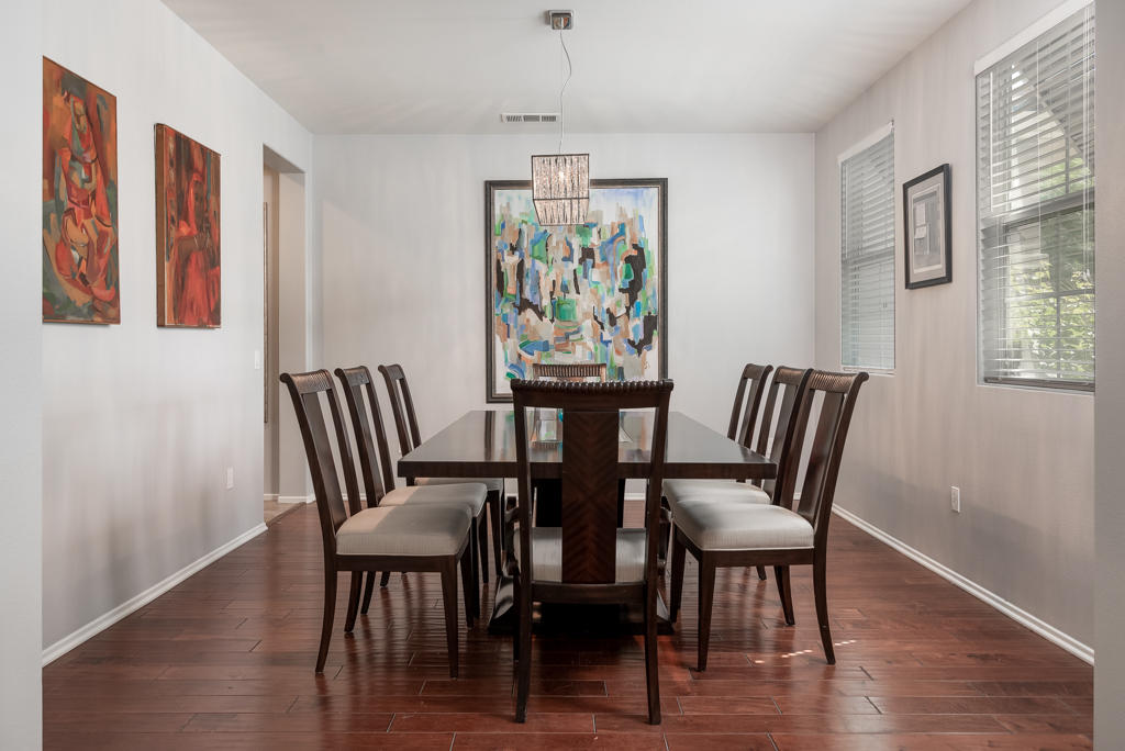 83460 Lone Star Road Indio, CA 92203 - Photo 5 of 40 a view of a dining room with furniture window and wooden floor