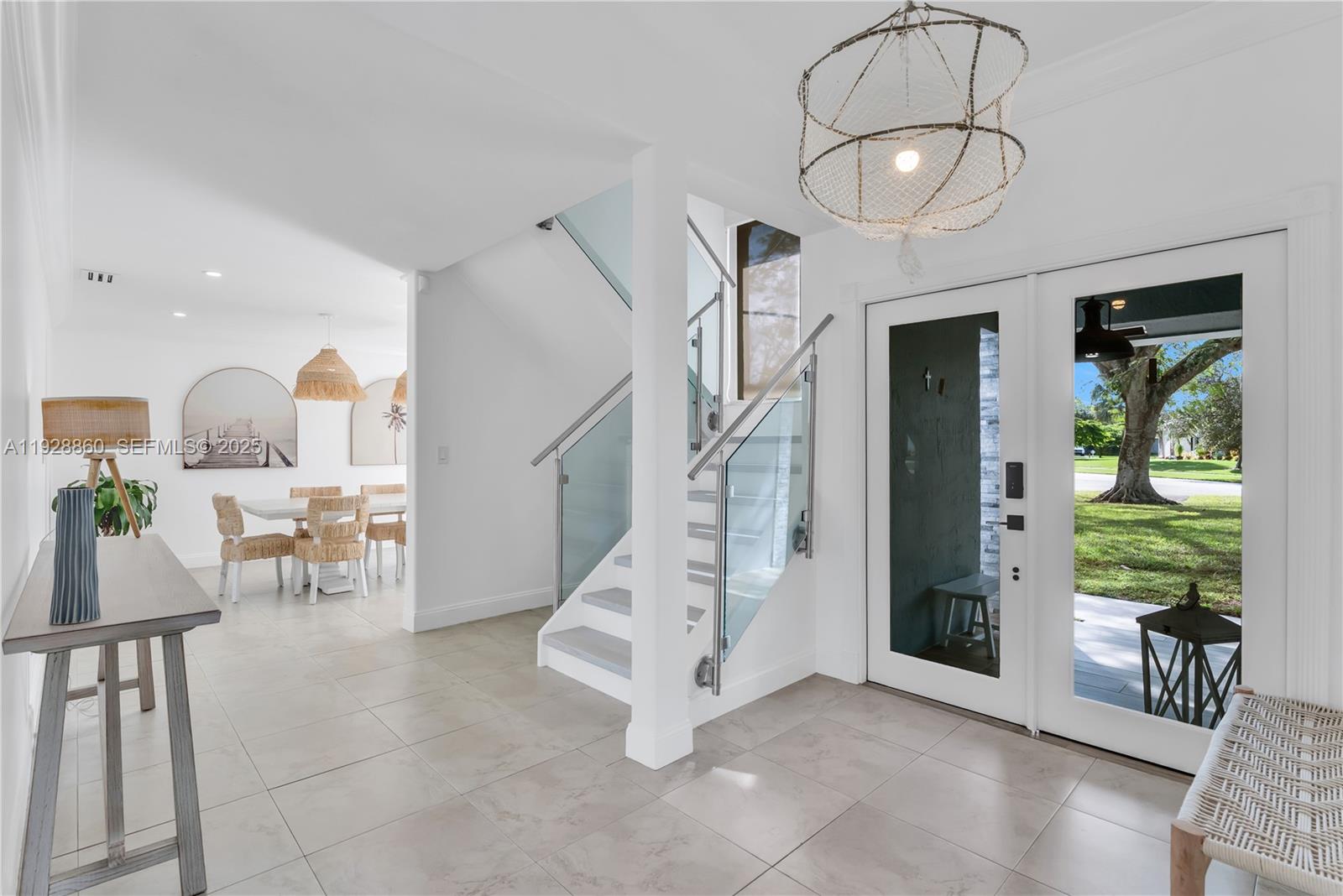 15151 Southwest 164th Terrace Miami, FL 33187 - Photo 2 of 37 a view of livingroom with furniture and staircase