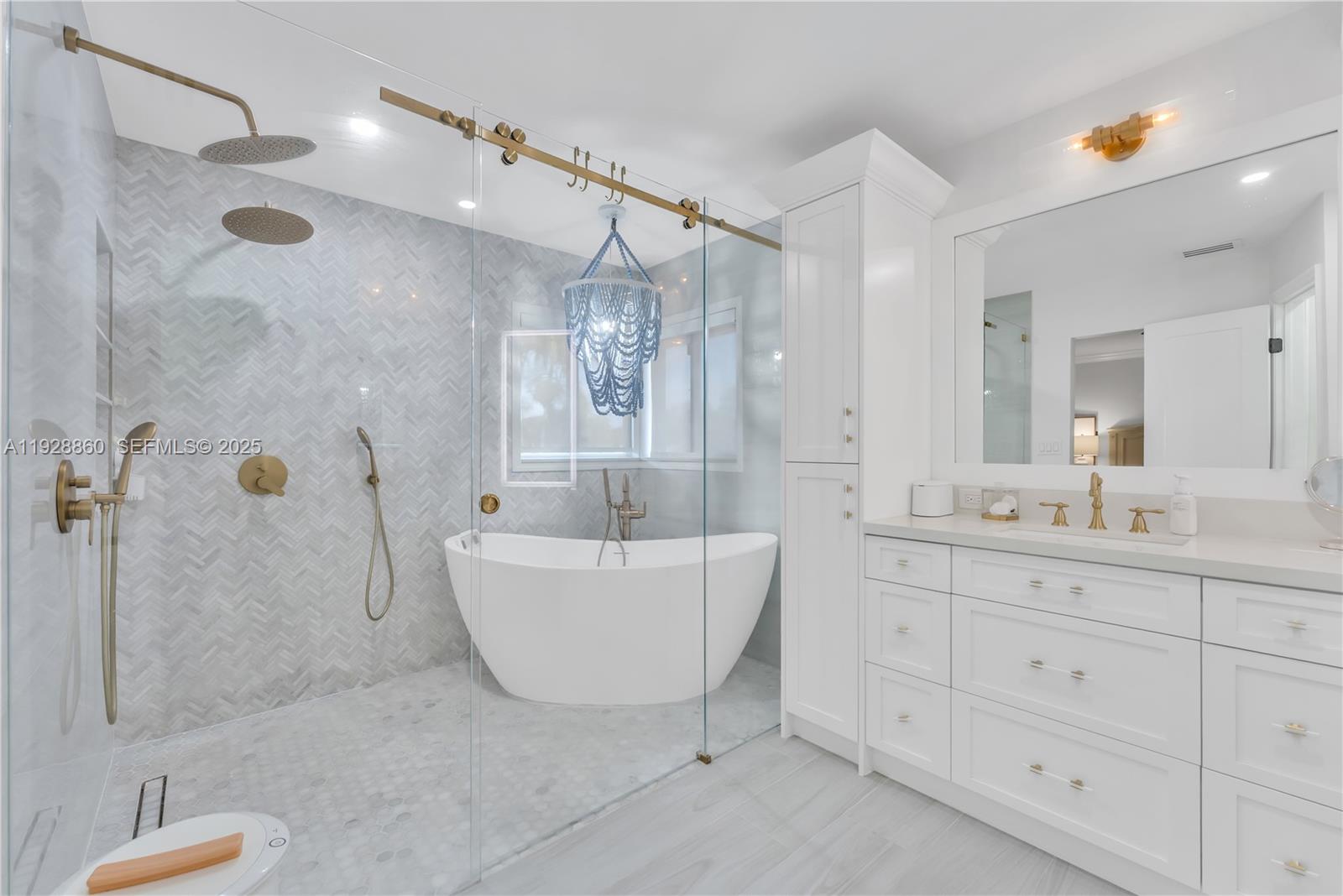 15151 Southwest 164th Terrace Miami, FL 33187 - Photo 24 of 37 a bathroom with a granite countertop sink a toilet a mirror and shower