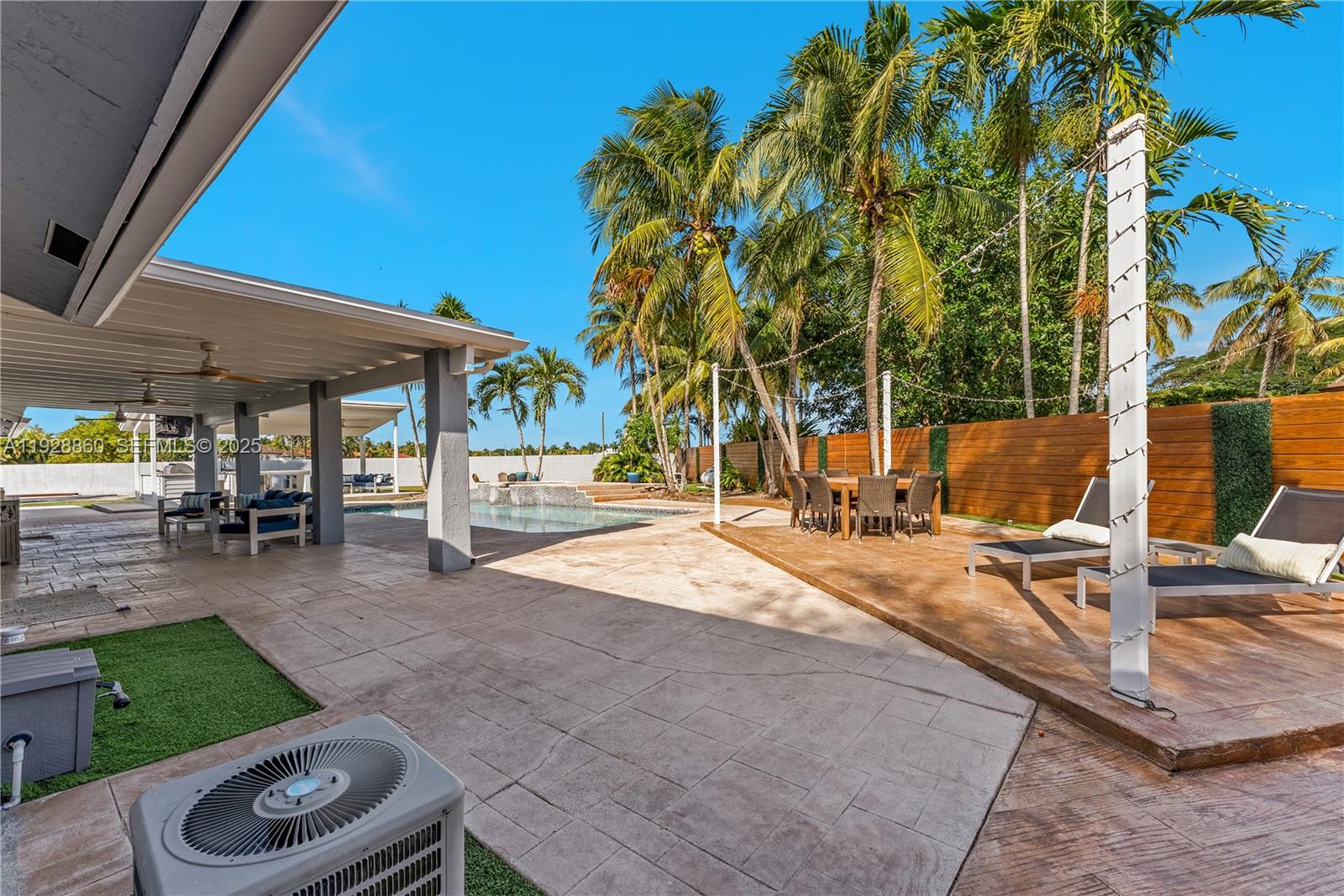 15151 Southwest 164th Terrace Miami, FL 33187 - Photo 26 of 37 a view of a backyard with a patio