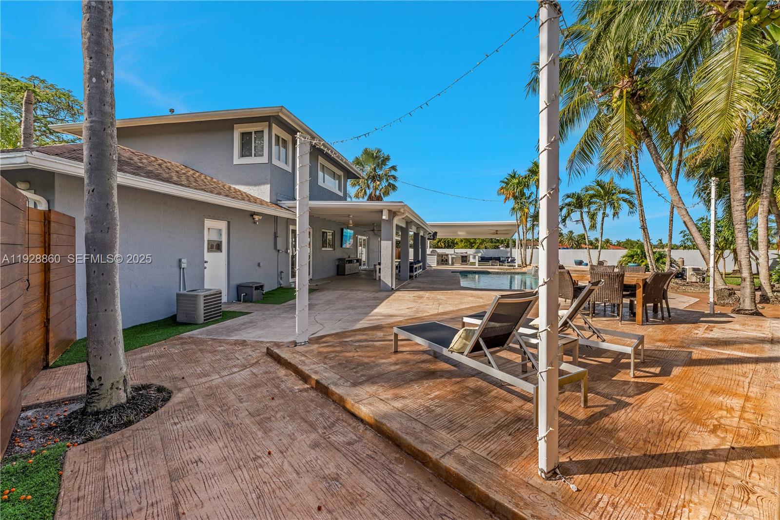 15151 Southwest 164th Terrace Miami, FL 33187 - Photo 27 of 37 a view of a house with backyard