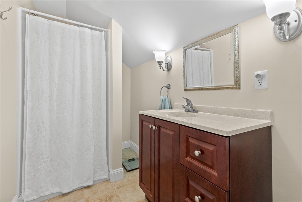 20 Freedom Way, Unit 20 Merrimac, MA 01860 - Photo 28 of 35 a bathroom with a sink vanity and a mirror
