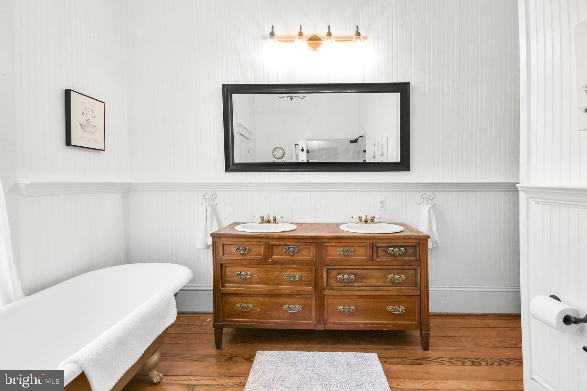 6229 Linganore Road Frederick, MD 21701 - Photo 53 of 91 a view of bedroom with furniture and wooden floor