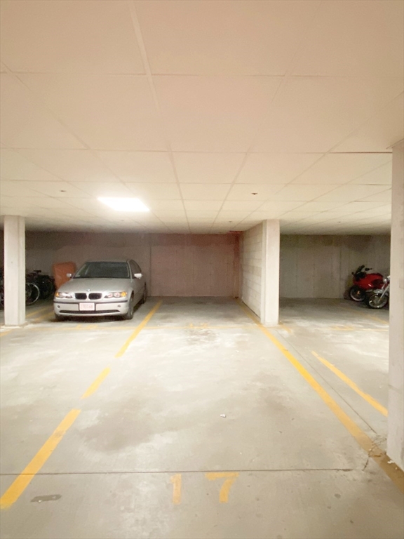 318 Rindge Avenue, Unit 405 Cambridge, MA 02140 - Photo 24 of 25 a view of car parked in the parking area