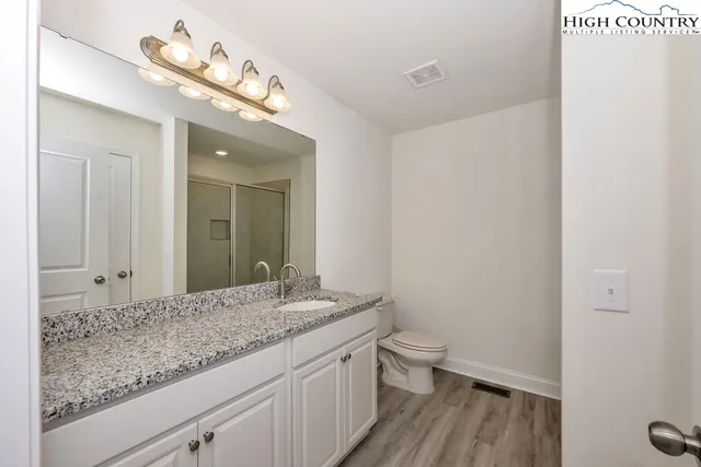 a view of a garden with trees