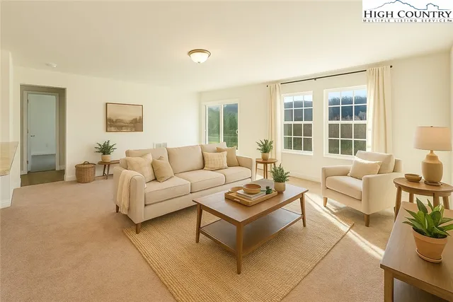 a view of a kitchen with a sink and cabinets