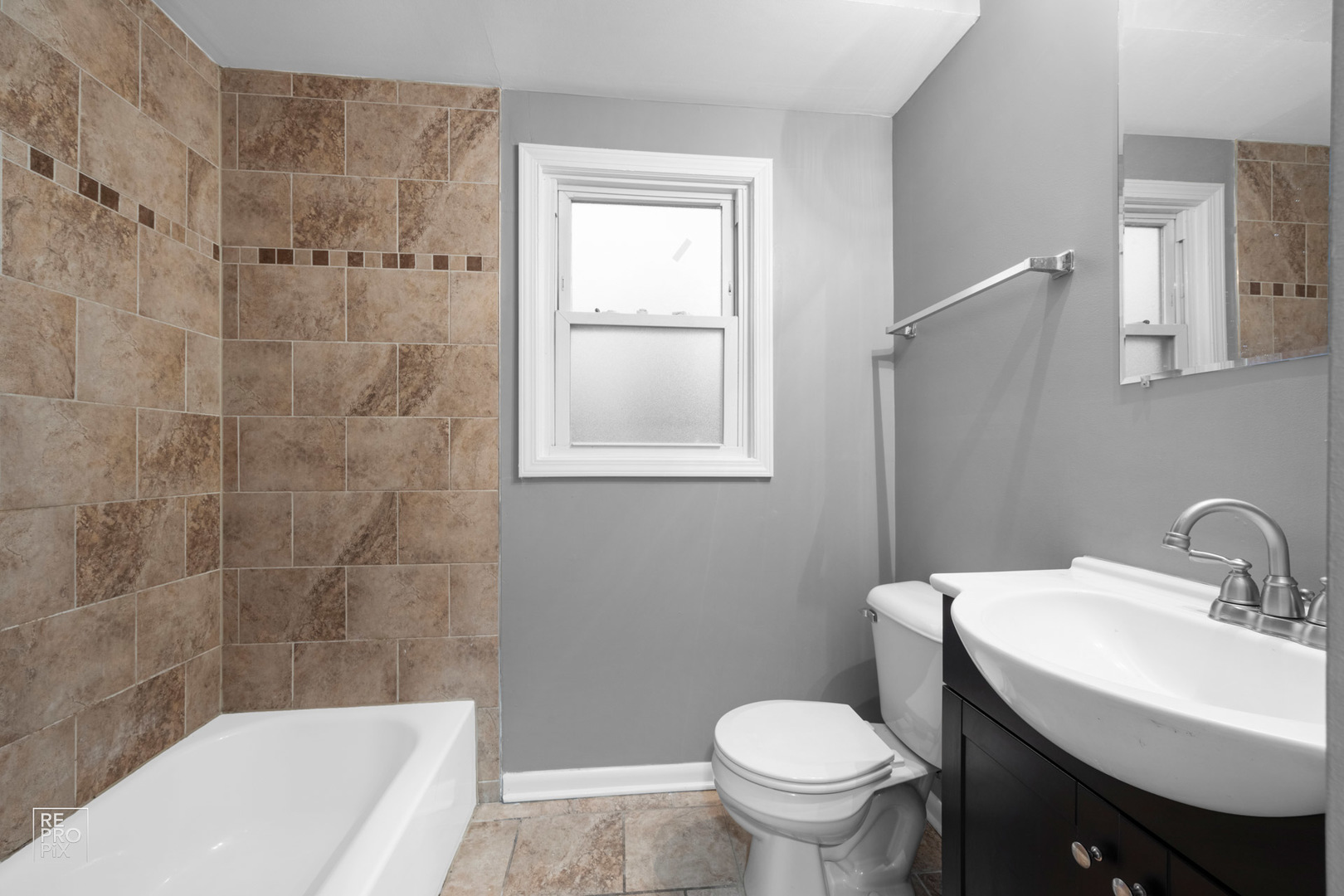 342 Pulaski Road Calumet City, IL 60409 - Photo 6 of 10 a bathroom with a sink toilet and shower