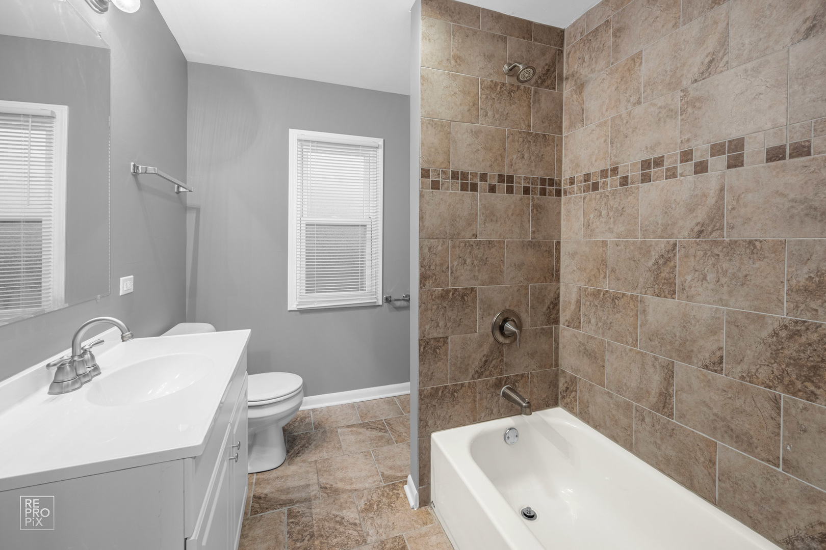 342 Pulaski Road Calumet City, IL 60409 - Photo 8 of 10 a bathroom with a sink toilet and shower