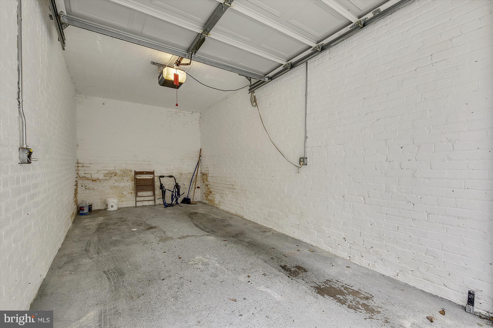 1816 Kalorama Road Northwest, Unit 302 Washington, DC 20009 - Photo 21 of 45 Apoxied garage floor and automatic garage opener