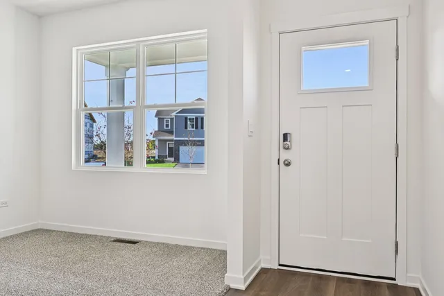 an empty room with shelves