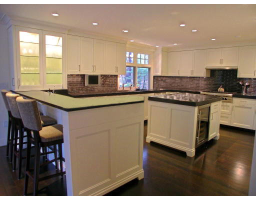 16 Hancock Road Weston, MA 02493 - Photo 15 of 23 a kitchen with stainless steel appliances granite countertop a stove and a sink