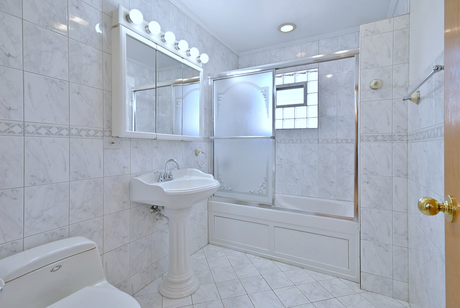2247 Elm Street River Grove, IL 60171 - Photo 12 of 31 a bathroom with a sink a toilet and shower