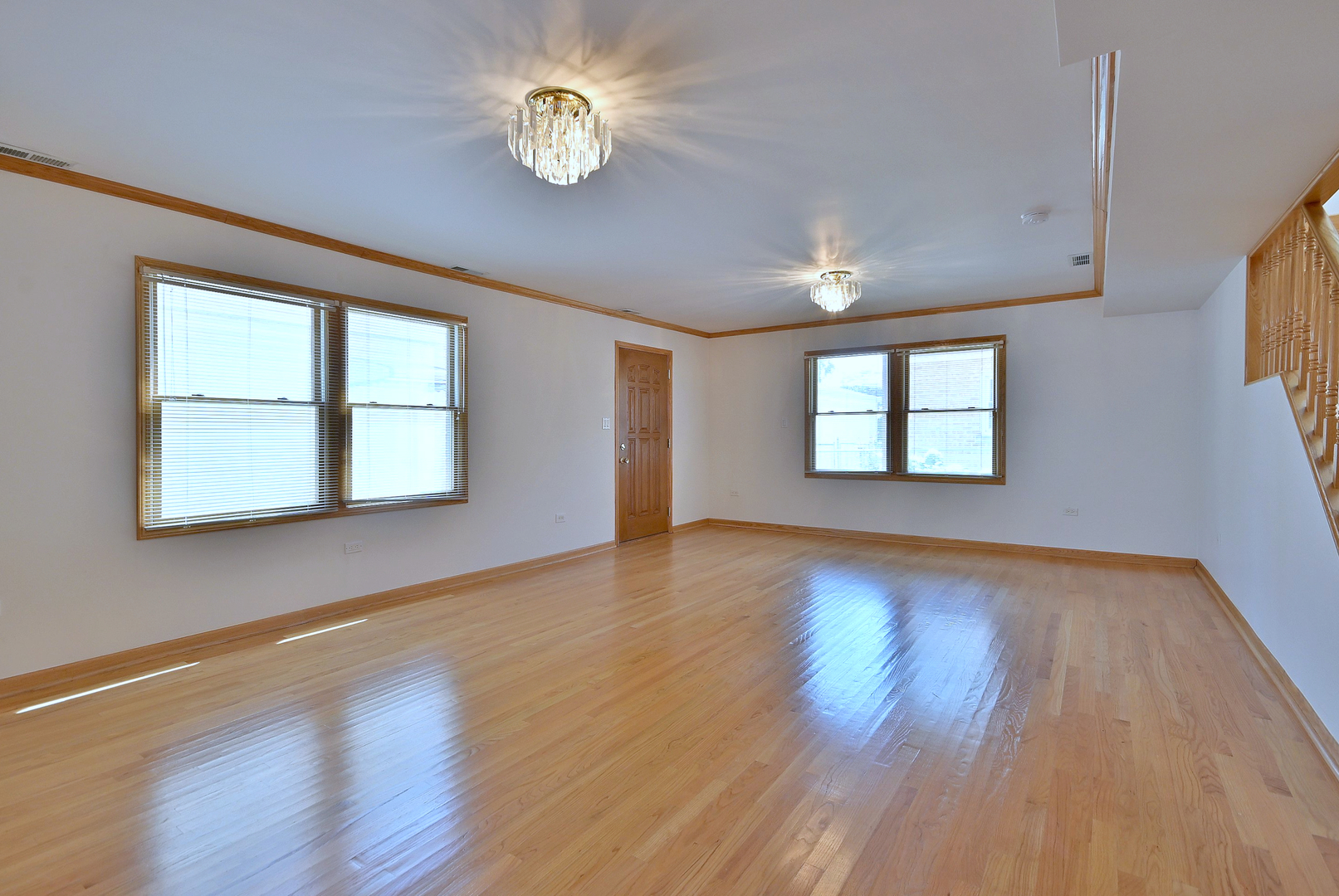 2247 Elm Street River Grove, IL 60171 - Photo 17 of 31 a view of an empty room with a window and wooden floor