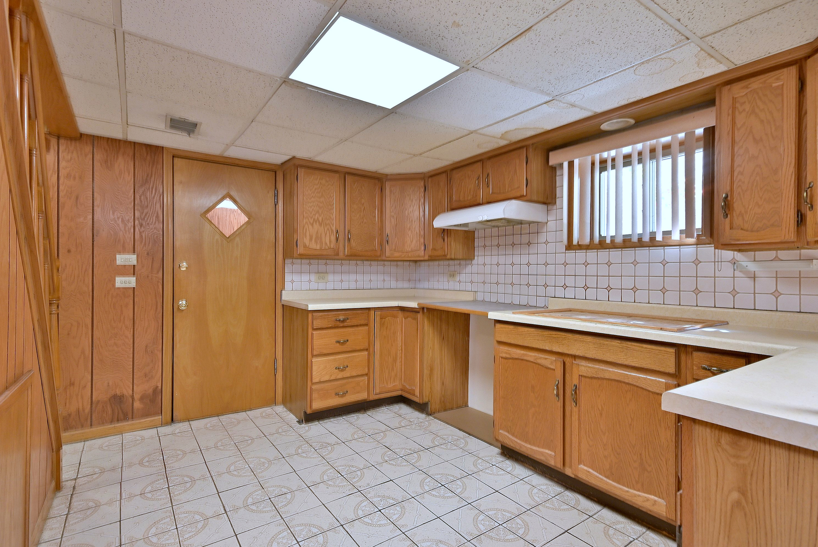 2247 Elm Street River Grove, IL 60171 - Photo 20 of 31 a kitchen with a sink cabinets and window
