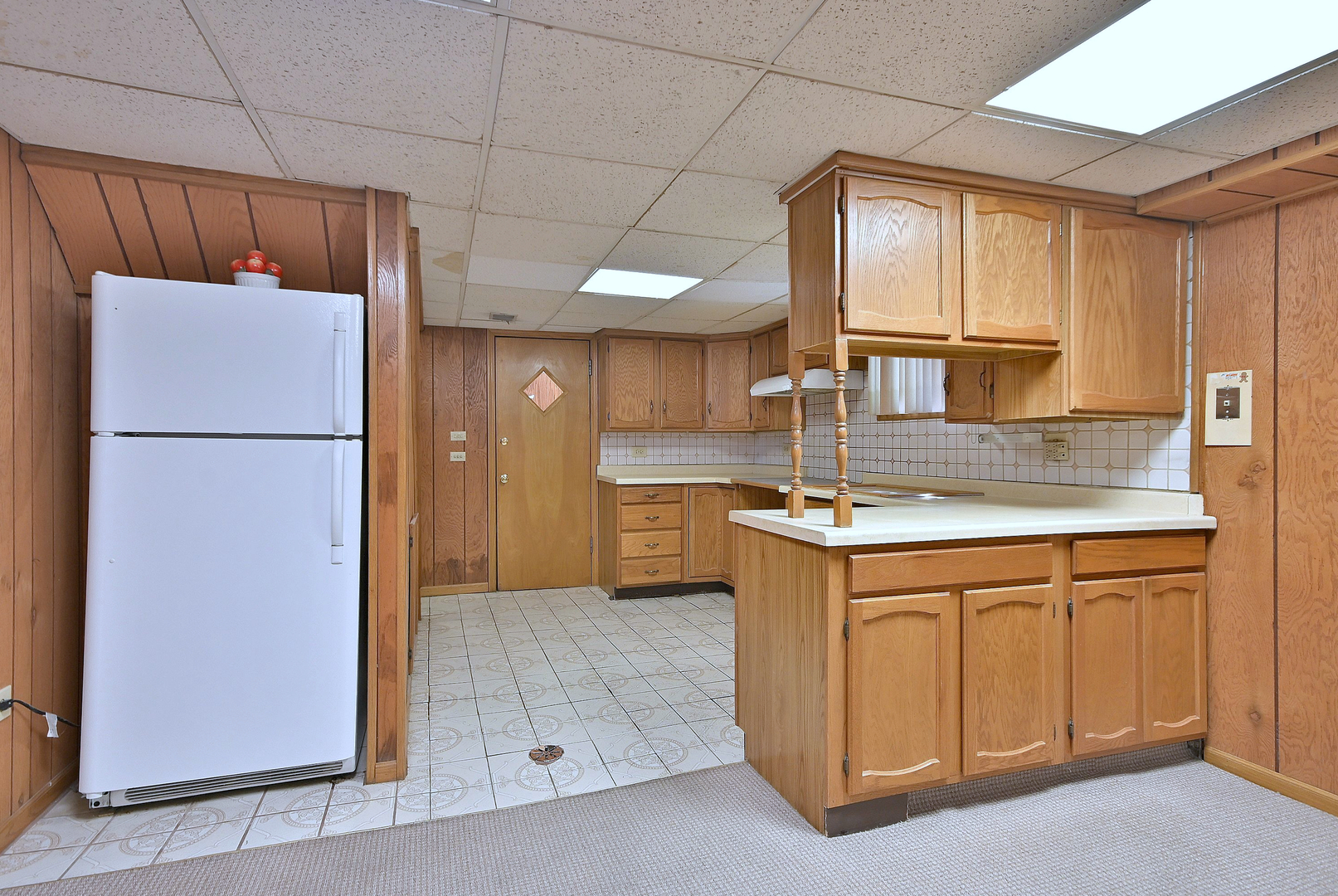 2247 Elm Street River Grove, IL 60171 - Photo 21 of 31 a kitchen with kitchen island granite countertop appliances cabinets and a sink