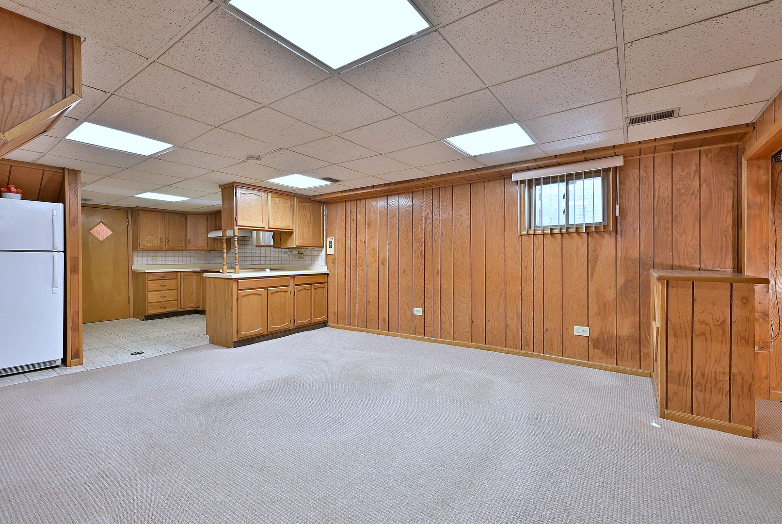 2247 Elm Street River Grove, IL 60171 - Photo 22 of 31 a view of an empty room with a kitchen