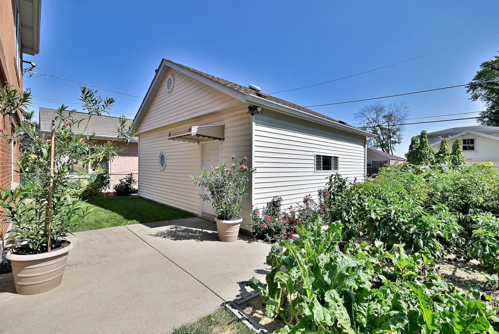2247 Elm Street River Grove, IL 60171 - Photo 26 of 31 a front view of a house with a yard