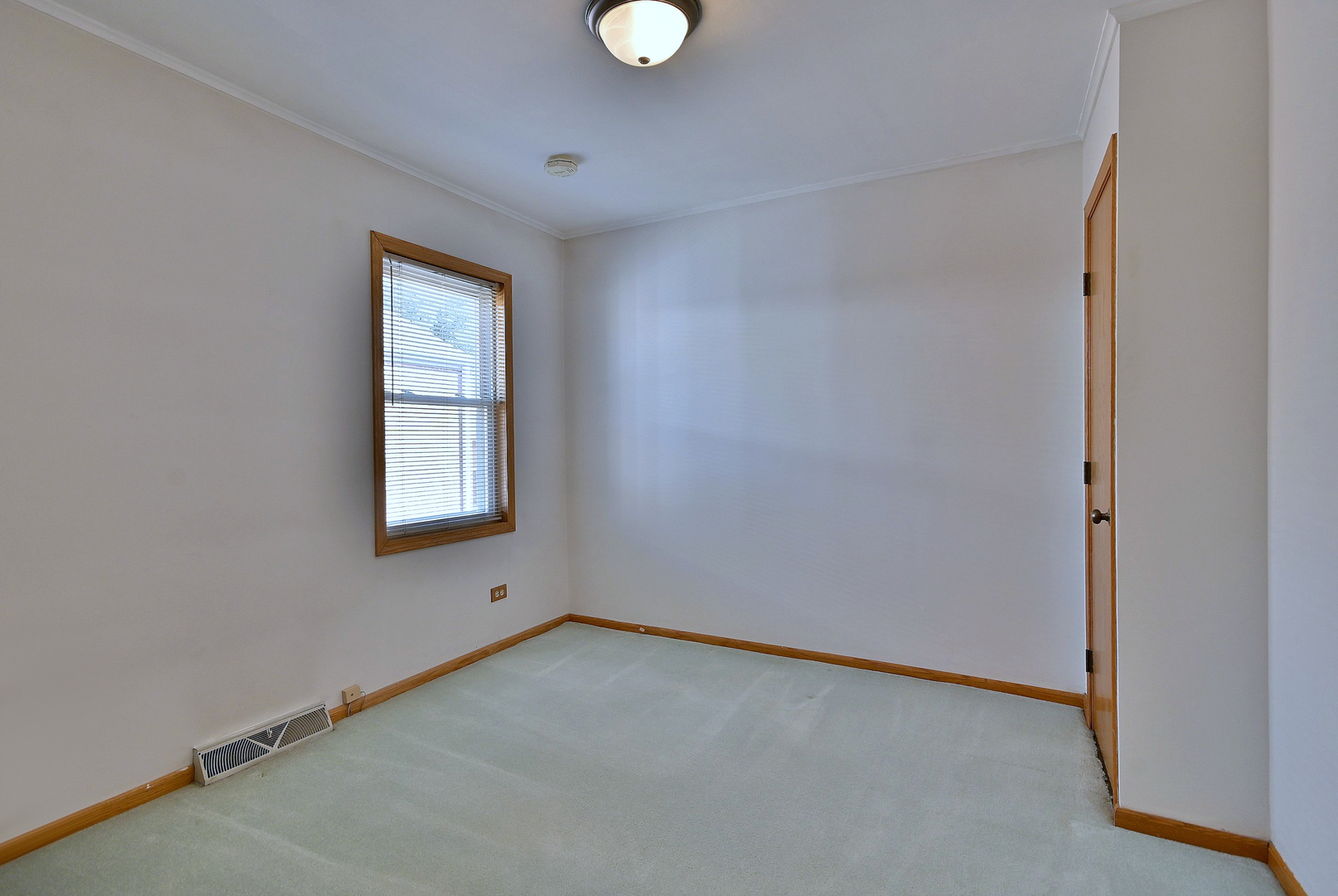 2247 Elm Street River Grove, IL 60171 - Photo 7 of 31 an empty room with windows and closet