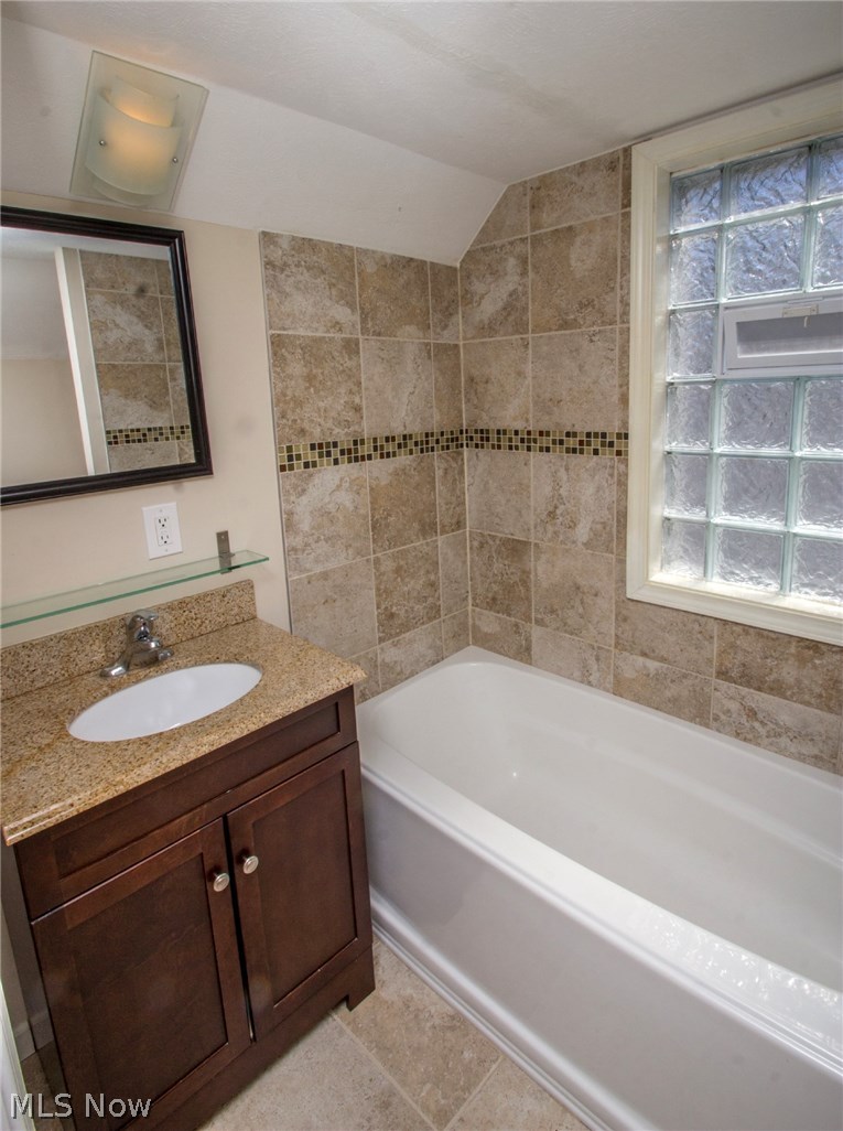 4237 Stilmore Road Cleveland, OH 44121 - Photo 13 of 17 Custom tile in ample 2nd floor 3 piece master suite bath!