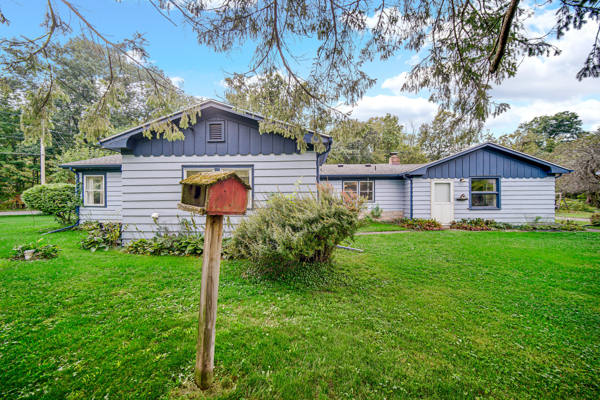1288 North Brummitt Road Chesterton, IN 46304 - Photo 20 of 23 a front view of a house with garden