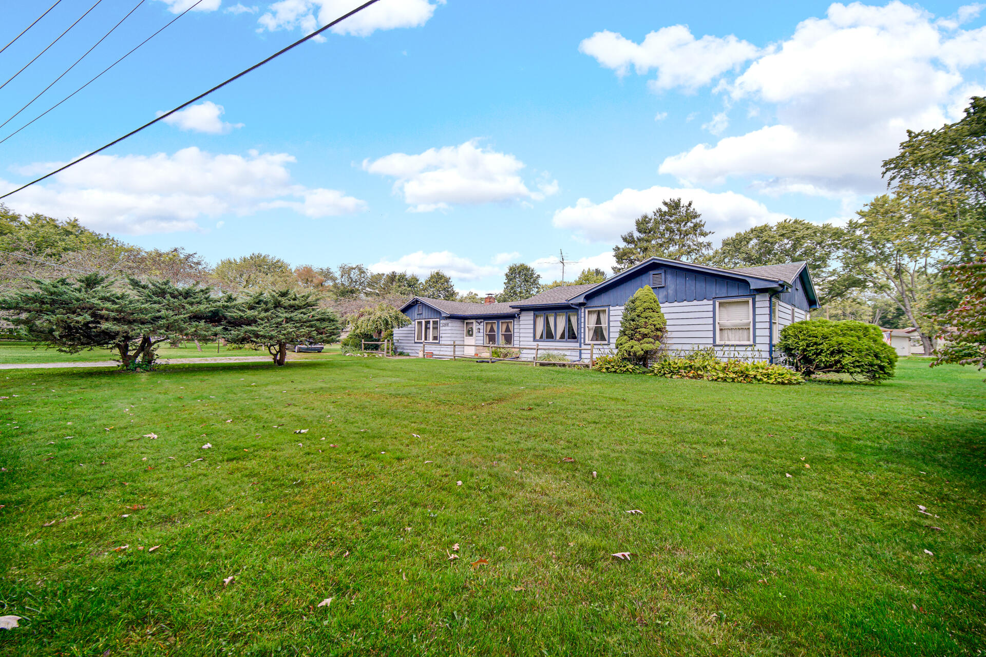 1288 North Brummitt Road Chesterton, IN 46304 - Photo 22 of 23 a view of a house with a big yard