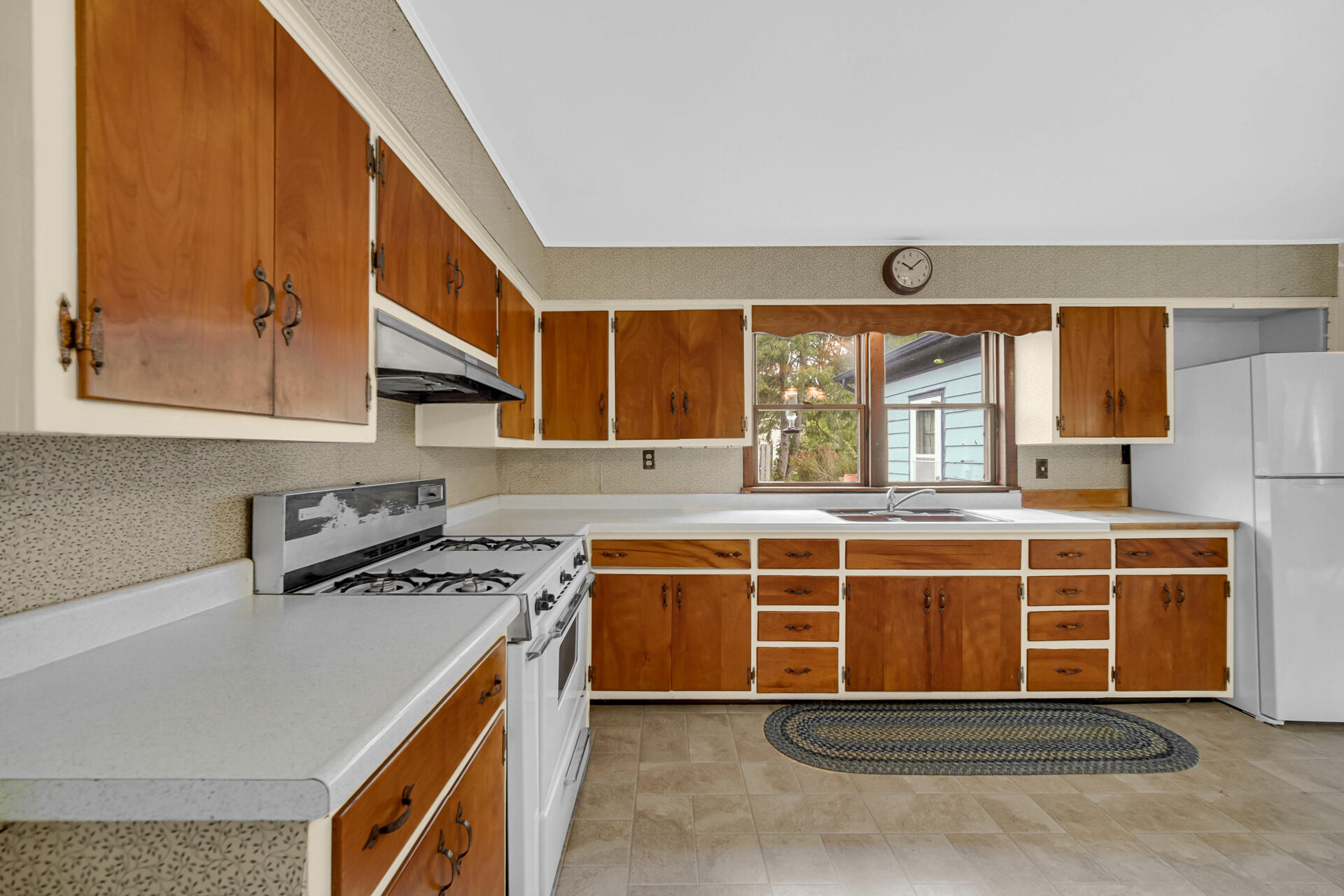 1288 North Brummitt Road Chesterton, IN 46304 - Photo 8 of 23 a view of a kitchen with stainless steel appliances granite countertop a stove and a sink