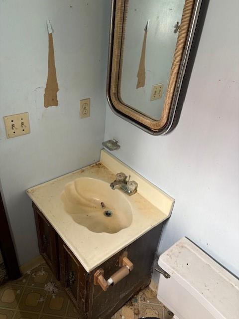 1278 Lincoln Street Vandergrift, PA 15690 - Photo 15 of 22 a bathroom with a sink and a mirror