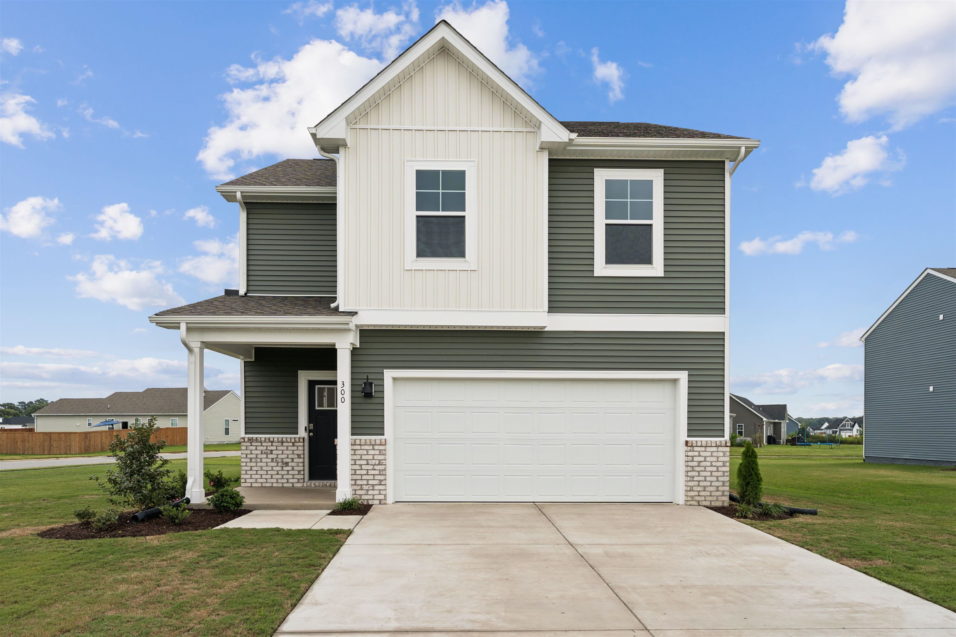 113 Meadow Ridge Way Staunton, VA 24401 - Photo 1 of 30 a front view of a house with garden