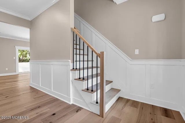 a kitchen with a sink dishwasher and cabinets