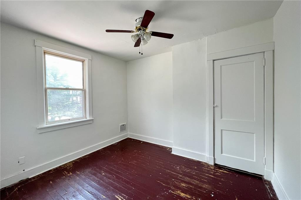 509 North Mathilda Street Pittsburgh, PA 15224 - Photo 15 of 24 a view of empty room with wooden floor and fan