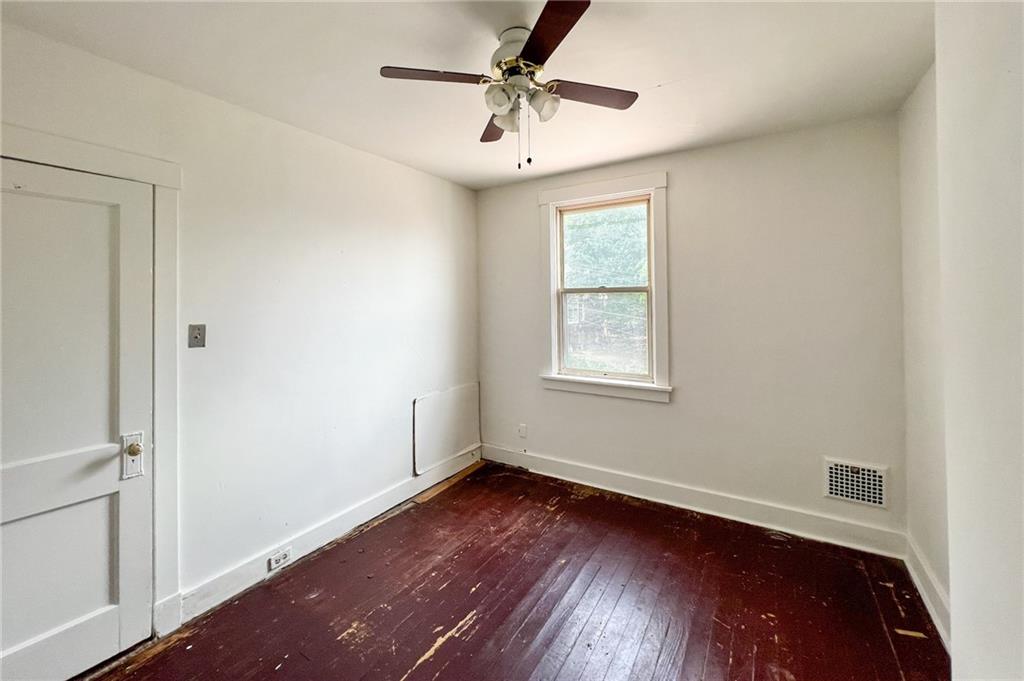 509 North Mathilda Street Pittsburgh, PA 15224 - Photo 16 of 24 wooden floor in an empty room with a window