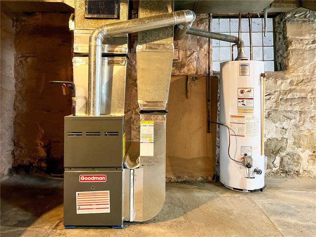 509 North Mathilda Street Pittsburgh, PA 15224 - Photo 19 of 24 a view of a blue house with a door and car parked