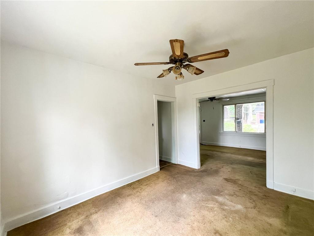 509 North Mathilda Street Pittsburgh, PA 15224 - Photo 5 of 24 an empty room with a empty space and chandelier fan