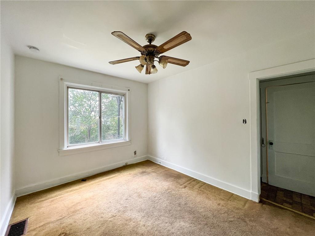 509 North Mathilda Street Pittsburgh, PA 15224 - Photo 6 of 24 a view of an empty room with a window