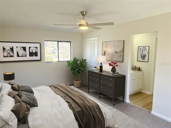 a bed room with a bed and a dresser