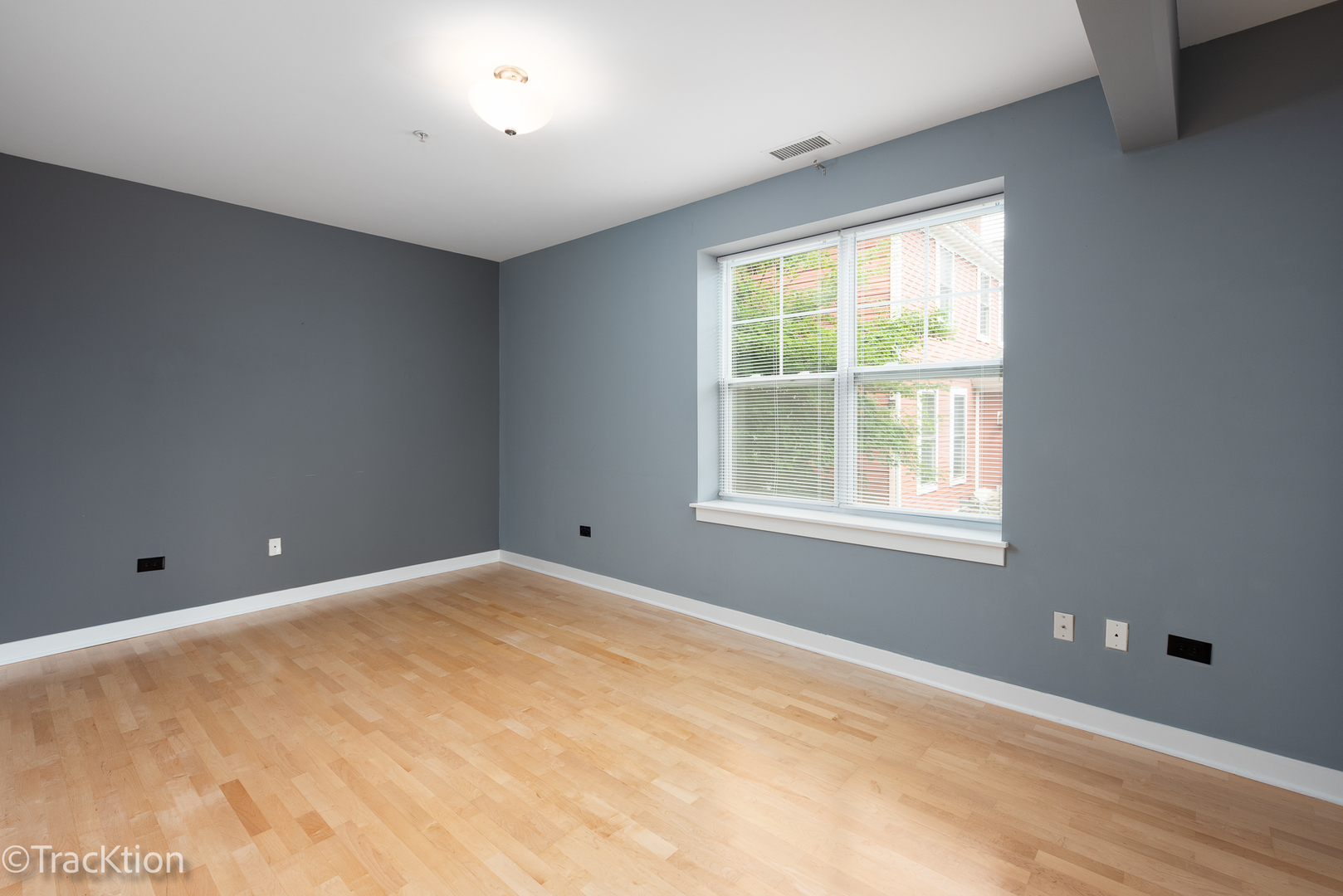 977 Harris Road, Unit 16 Grayslake, IL 60030 - Photo 11 of 41 a view of an empty room with a window