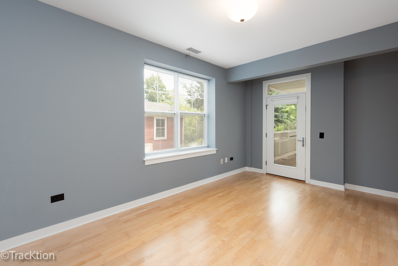 977 Harris Road, Unit 16 Grayslake, IL 60030 - Photo 12 of 41 a view of an empty room with a window