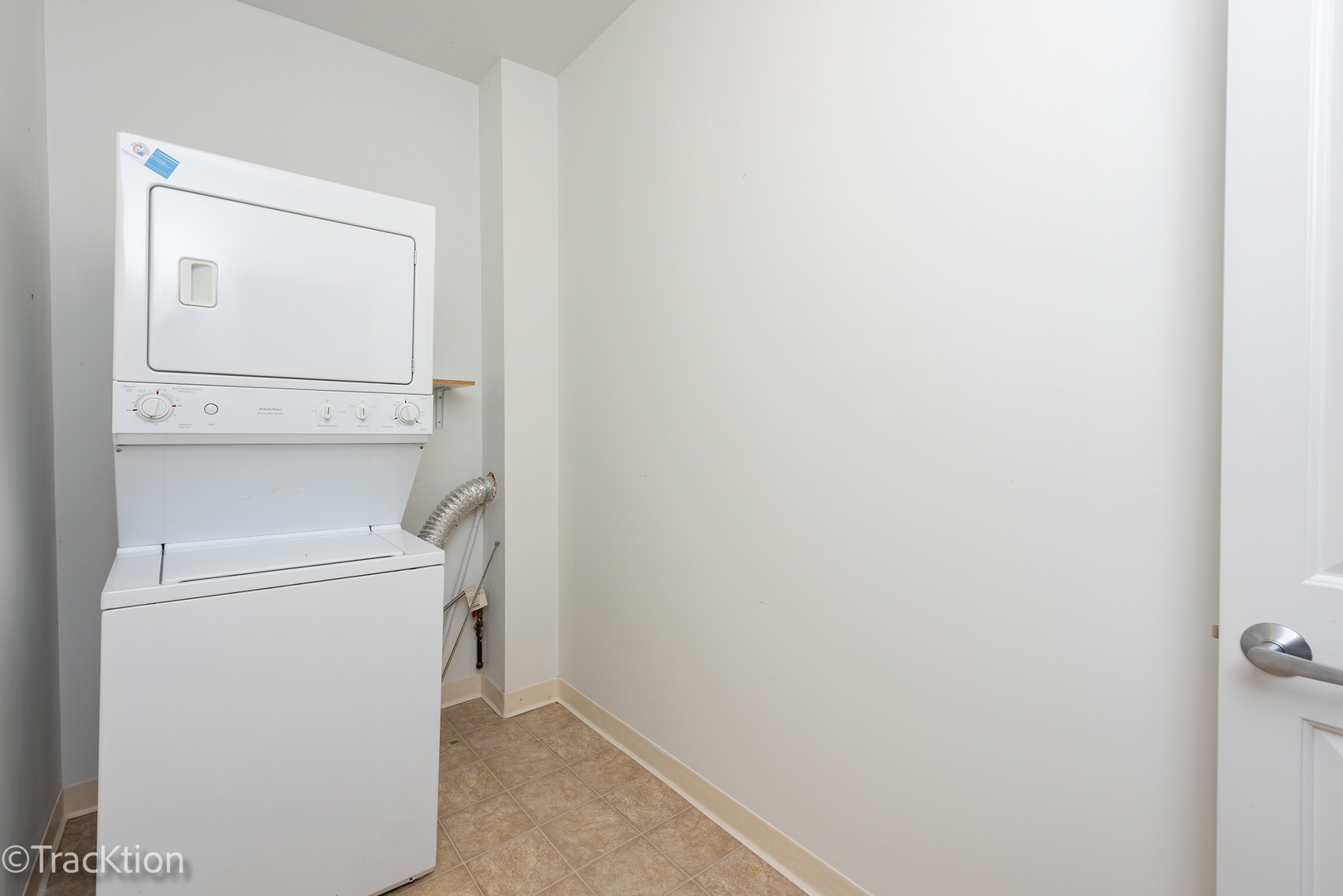 977 Harris Road, Unit 16 Grayslake, IL 60030 - Photo 17 of 41 a utility room with dryer and washer