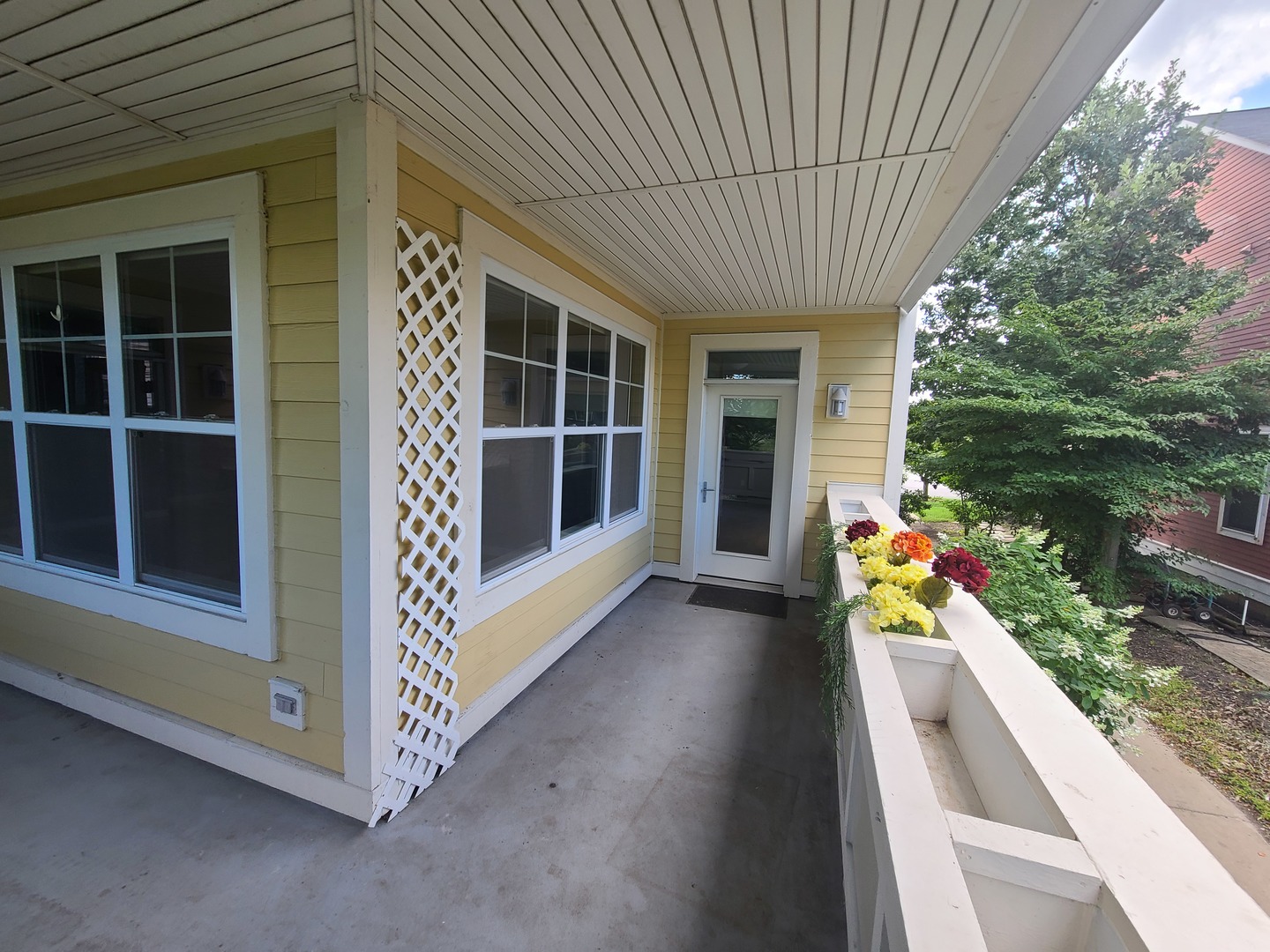 977 Harris Road, Unit 16 Grayslake, IL 60030 - Photo 18 of 41 a view of a house with a porch