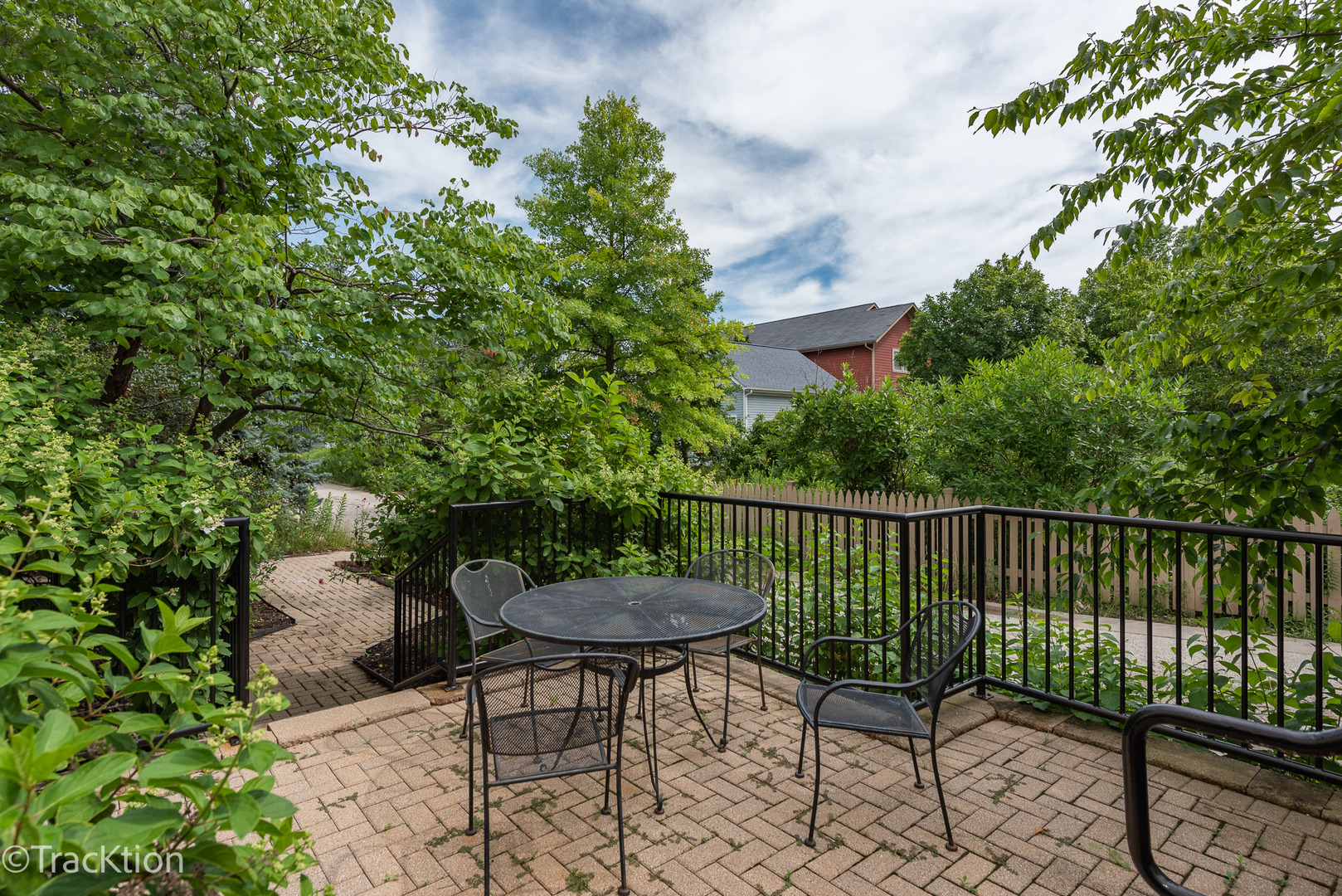 977 Harris Road, Unit 16 Grayslake, IL 60030 - Photo 22 of 41 a view of a chairs and table in backyard