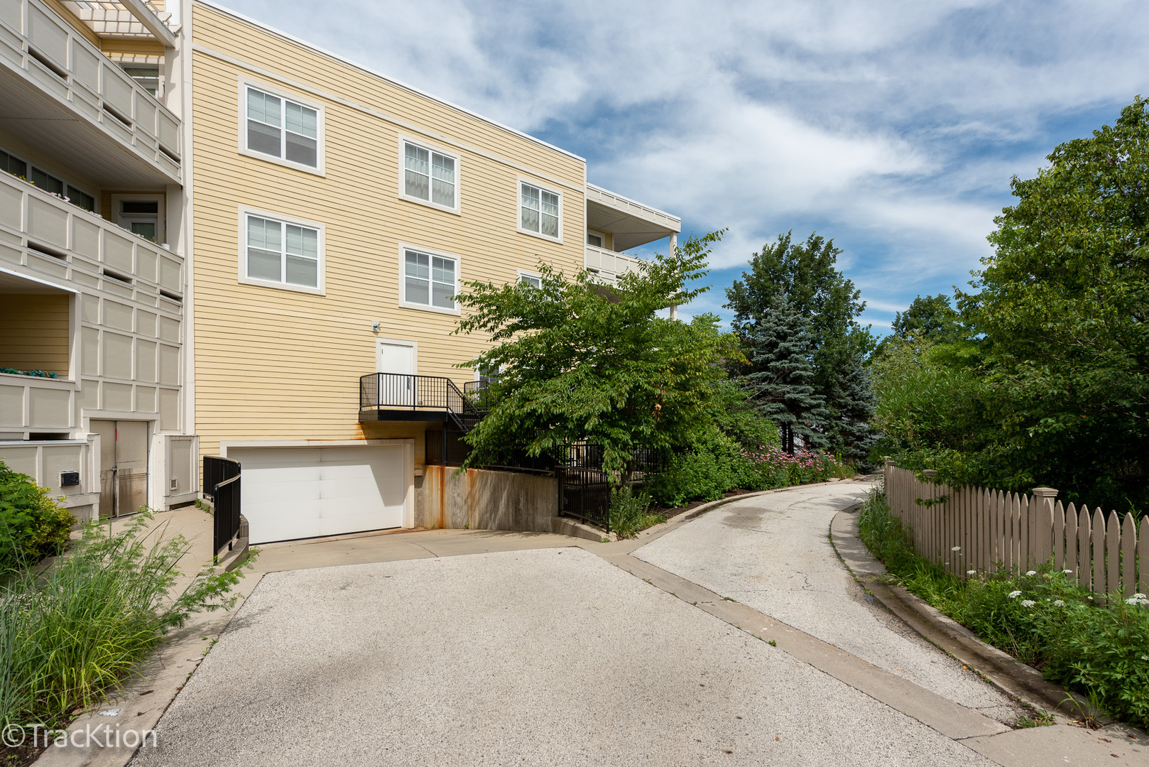 977 Harris Road, Unit 16 Grayslake, IL 60030 - Photo 23 of 41 a front view of a house with a yard