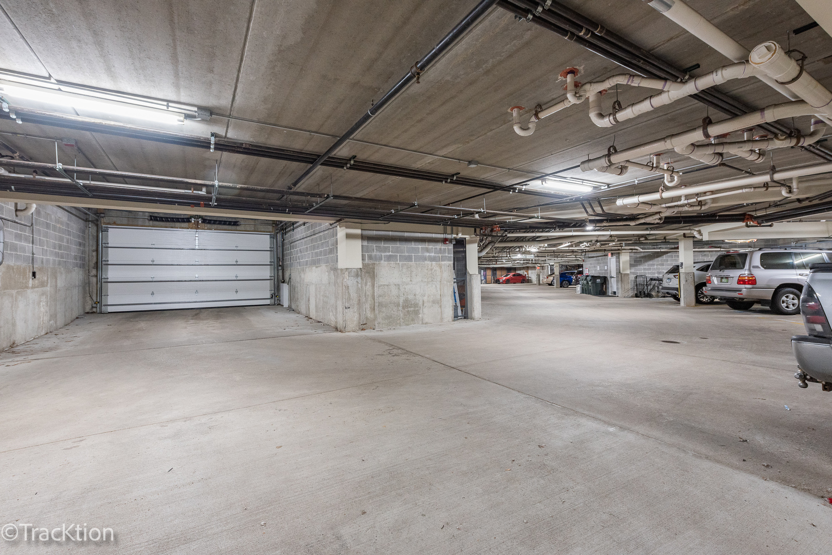 977 Harris Road, Unit 16 Grayslake, IL 60030 - Photo 24 of 41 a view of parking garage with cars
