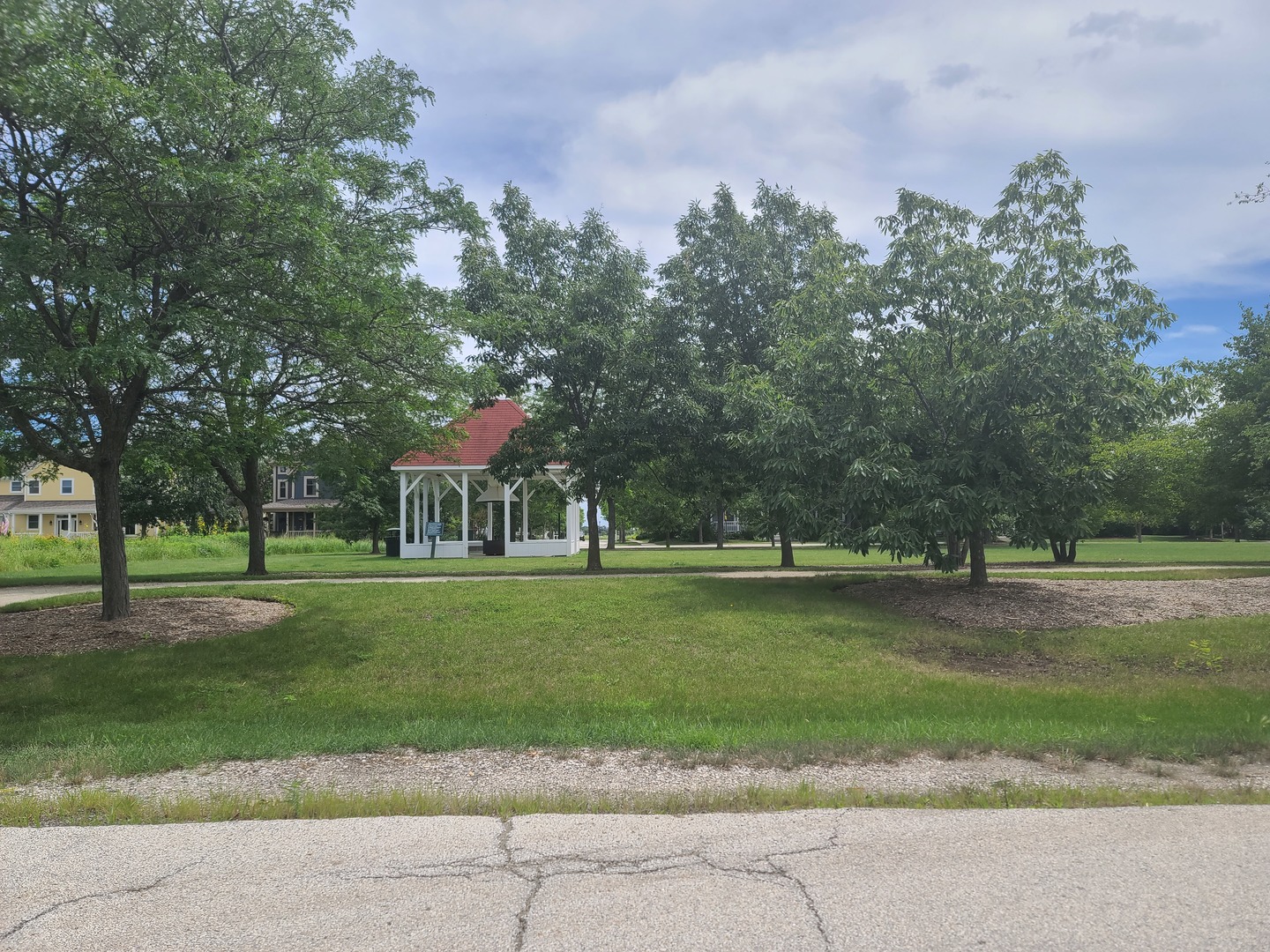 977 Harris Road, Unit 16 Grayslake, IL 60030 - Photo 28 of 41 a front view of a house with a yard