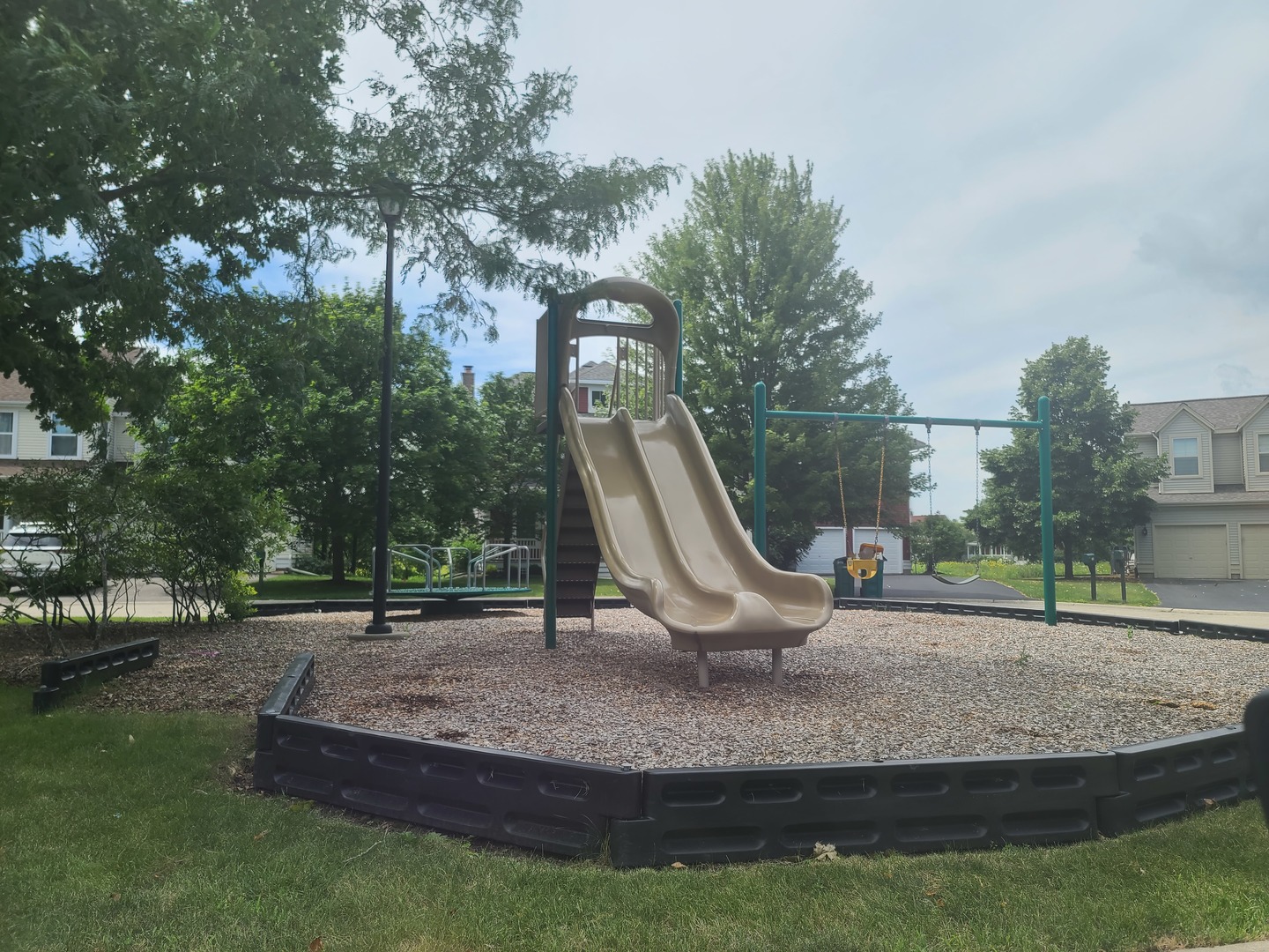 977 Harris Road, Unit 16 Grayslake, IL 60030 - Photo 29 of 41 a view of a park with slide