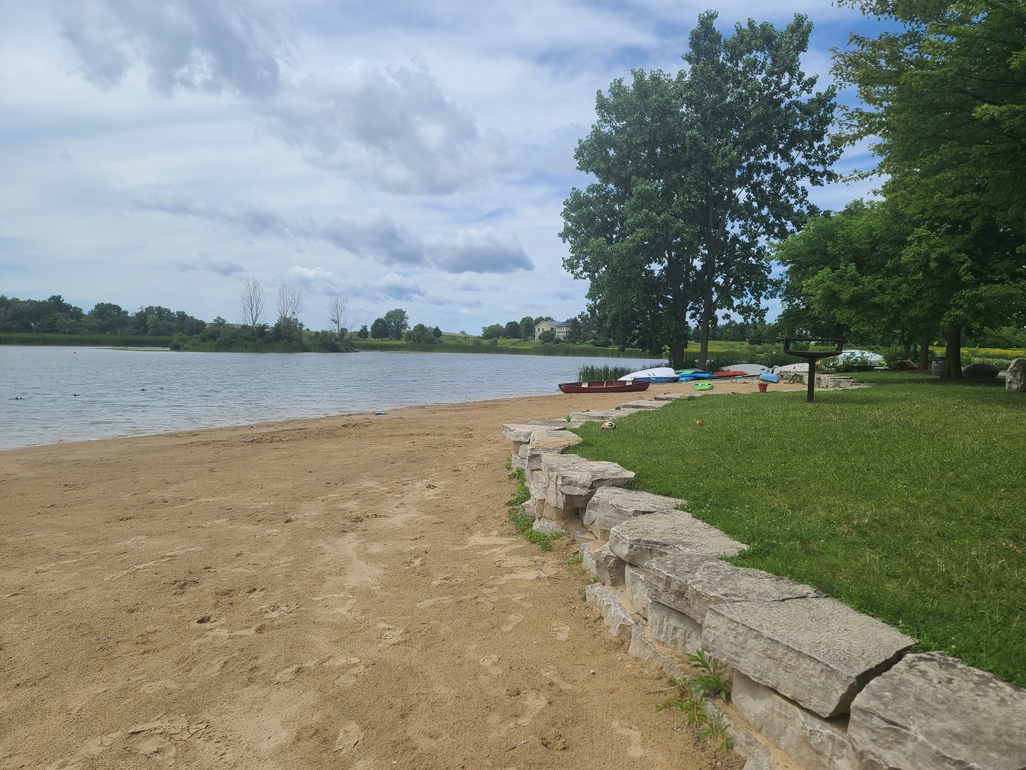 977 Harris Road, Unit 16 Grayslake, IL 60030 - Photo 35 of 41 a view of a lake with houses in the back