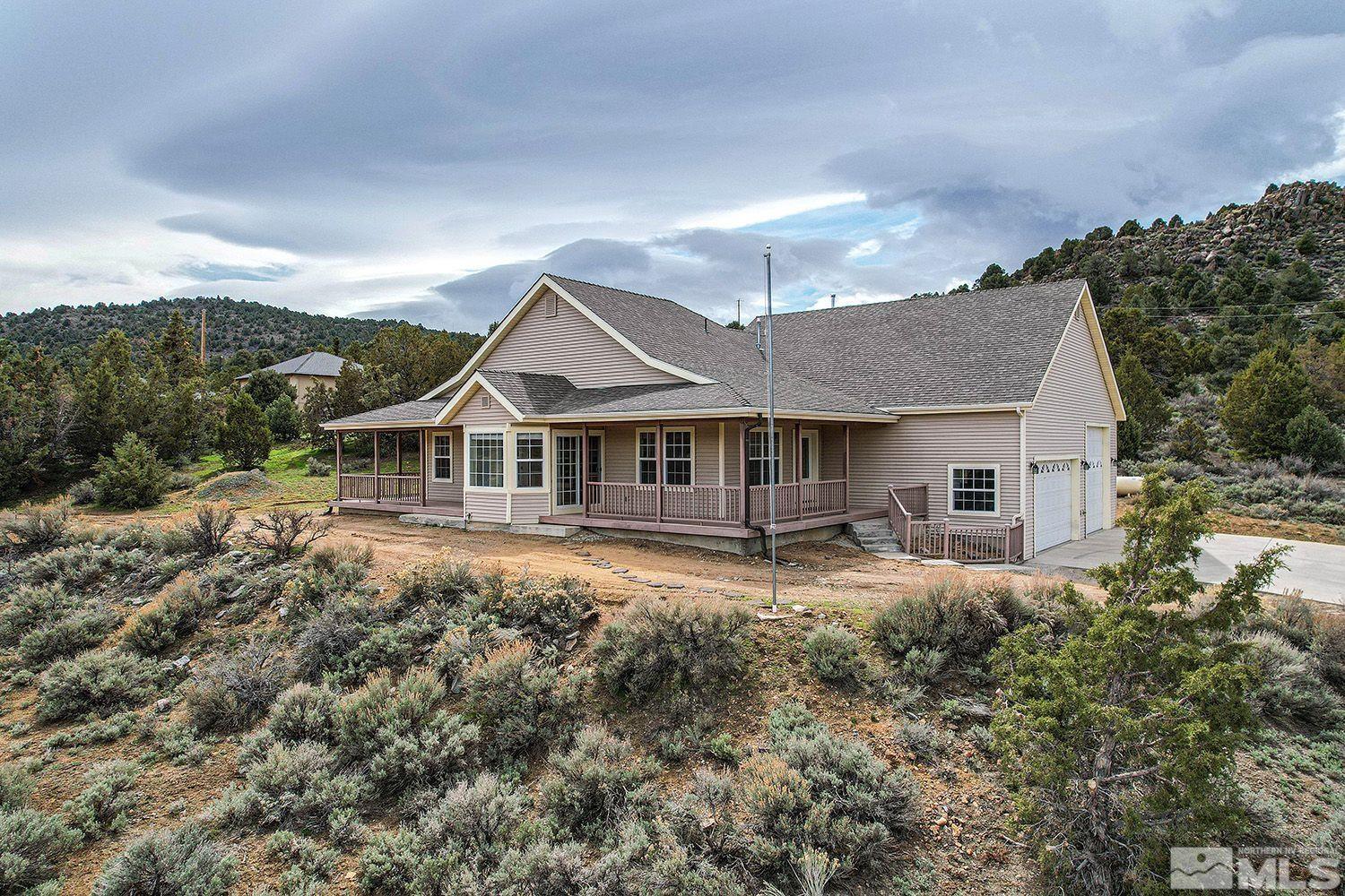 22000 Panhandle Road Reno, NV 89521 - Photo 1 of 1 a front view of a house with yard