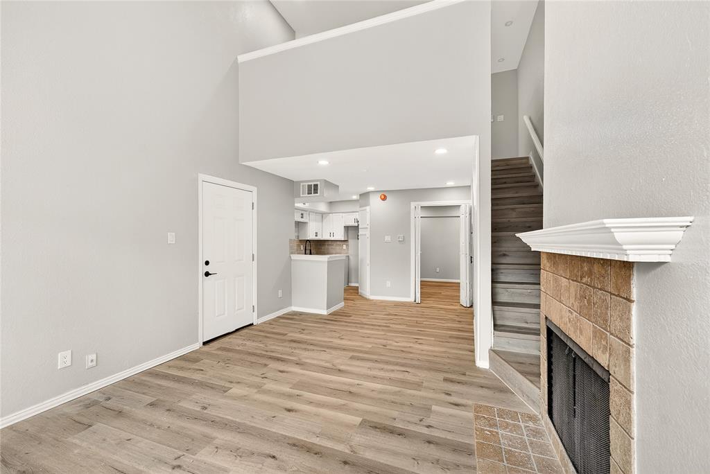 9801 Walnut Street, Unit 212 Dallas, TX 75243 - Photo 3 of 16 a view of a kitchen cabinets and entryway