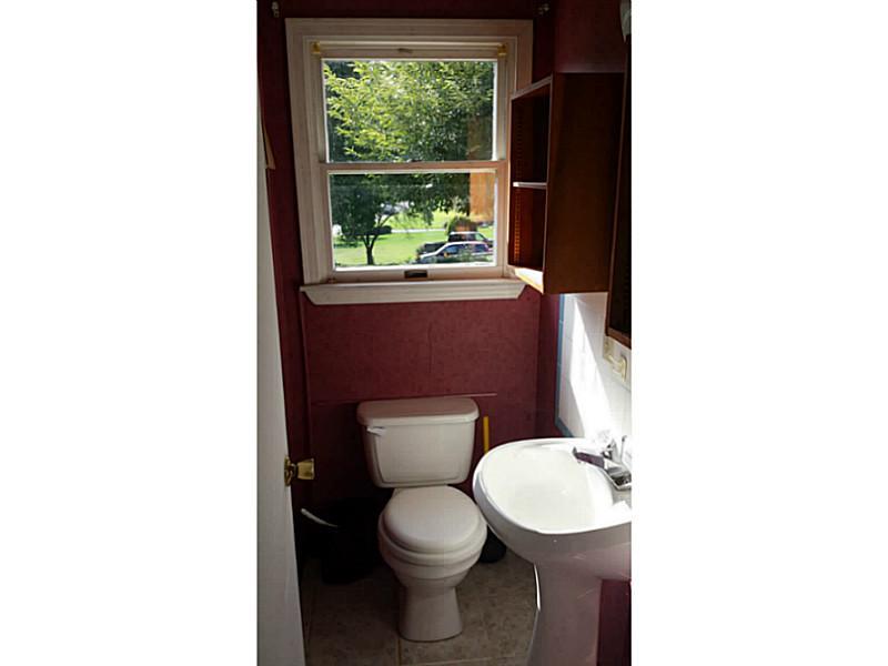 107 Perry Hite Road Greensburg, PA 15601 - Photo 14 of 18 Exterior Front. Powder room adjacent to laundry area.