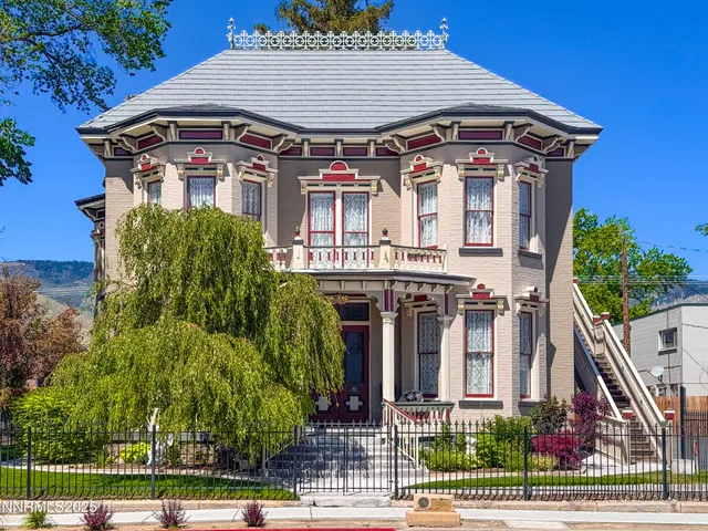 front view of a house with a small yard